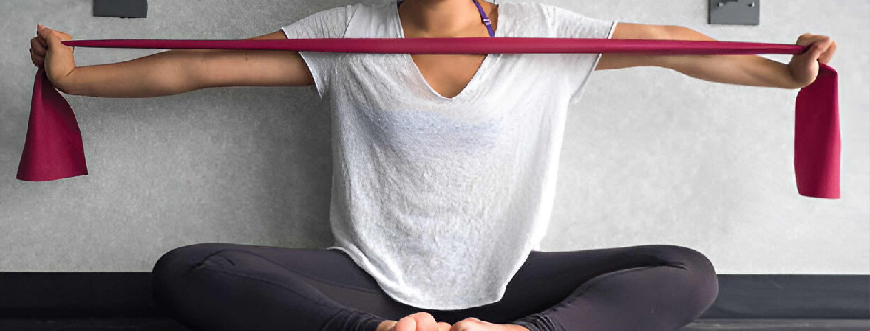  woman working out with resistance band